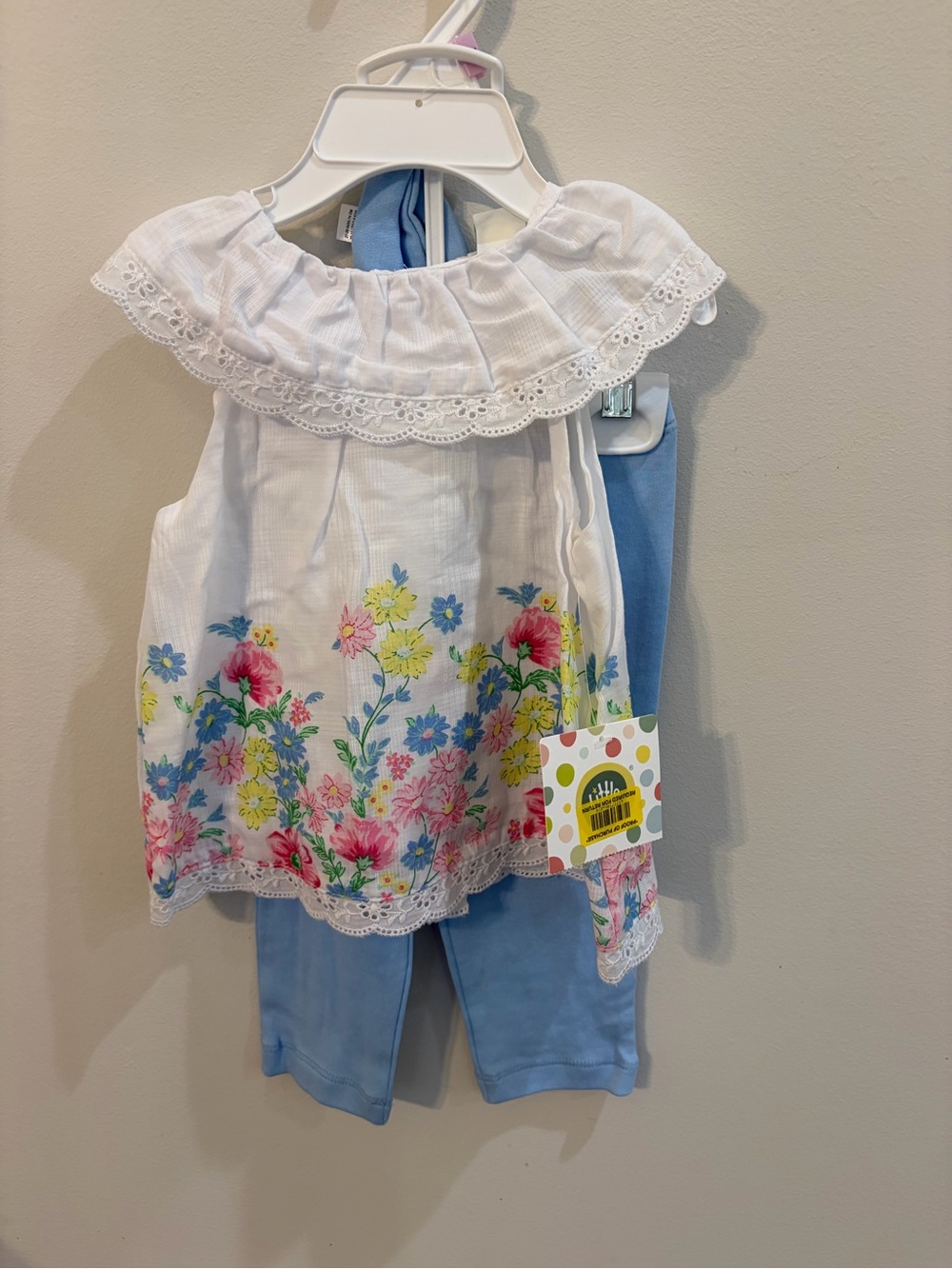 Little Me White Floral Ruffle Top with Blue Leggings